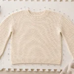 Blocking a handmade sweater flatlay